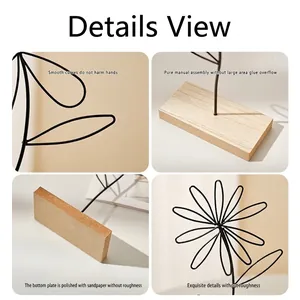 Nordic iron flower ornament with black wire petals and rectangular wooden base