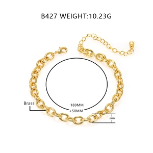 Polished 18k gold plated brass chain bracelet with adjustable extension on white background