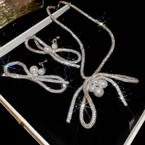 Elegant Rhinestone And Imitation Artificial Pearl Bow Necklace And Ear Clip Set For Women Silver Color Ribbon Jewelry