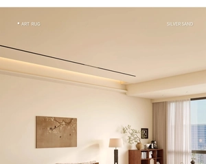 Artistic living room setting featuring Silver Sand rug collection and minimalist decor