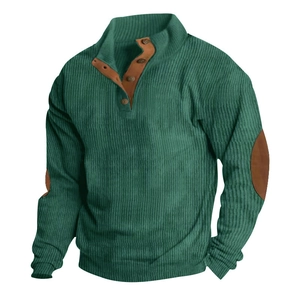 Detail of green corduroy men's jacket with brown faux leather shoulder and elbow patches