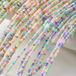 Macro shot of colorful macaron-toned textured beads for handmade jewelry DIY