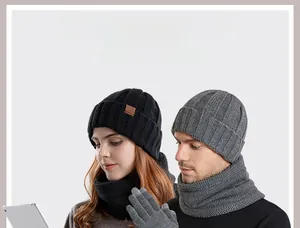Detail of winter knitted set showing thermal lining and touchscreen glove fingertips