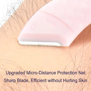 Pink fish-shaped eyebrow razor with micro-guard blade for safe facial hair grooming