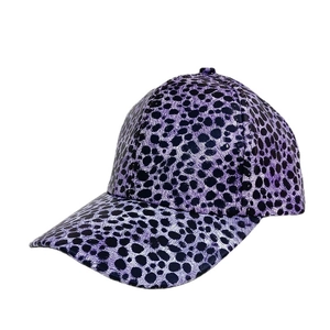 Purple leopard print baseball cap with metallic faux leather finish and curved brim