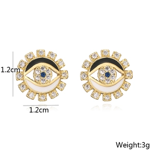 Detail view showing evil eye stud earrings with blue pupil and 1.2cm size measurement
