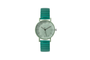 Detail of teal elastic metal band and green dial watch with heart-shaped second hand