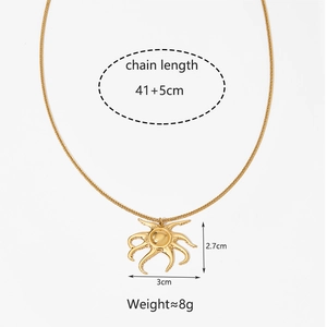 Detailed view of golden octopus pendant with chain length 41+5cm and weight 8g specs
