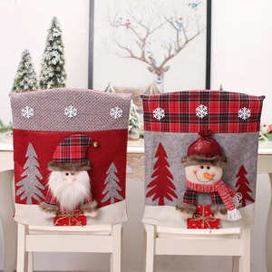 Christmas chair covers featuring 3D Santa and Snowman designs in festive red and grey plaid