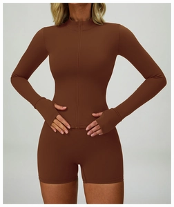 Detail of coffee brown zip-up sports jacket with high collar and thumbhole cuffs