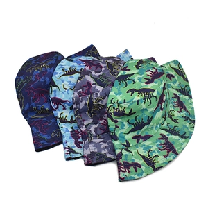 Detail showing four assorted camouflage dinosaur print bucket hats for children sun protection
