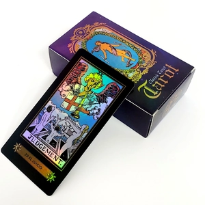 Detail of holographic Judgement Tarot card and classic purple packaging box
