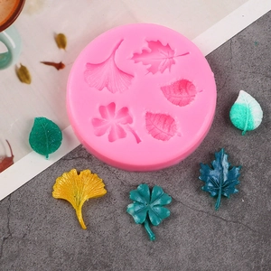 Pink silicone mold for ginkgo, maple, and clover leaf shapes for DIY fondant and resin