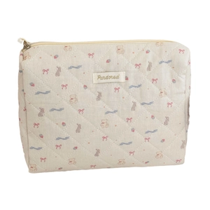 Beige quilted bear cosmetic bag with embroidered animal patterns and zip closure