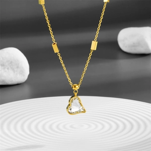 Minimalist gold heart pendant necklace with crystal stone on elegant beaded chain link