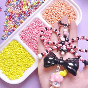DIY beaded phone charm with black bow, acrylic beads and cute girl pendant charm
