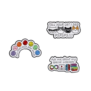 Three enamel pins featuring expressive slogans and cat motifs for backpacks and bags