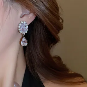 Elegant silver drop earrings with sparkling lavender zircon stones and waterdrop pendants