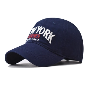 Detail of navy cotton baseball cap with white New York 3D embroidery and USA patch