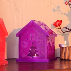 Purple house-shaped resin mold for Christmas candle holders with snowflake patterns