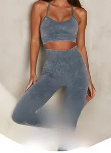 Detail of seamless high waist yoga leggings and cross back bra in grey heather fabric
