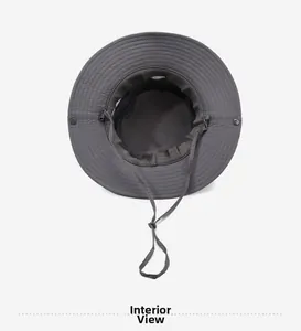 Detail of outdoor sun hat featuring breathable mesh lining and adjustable windproof strap