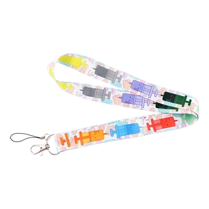 Detail of medical lanyard with colorful syringe patterns and silver metal hook for ID cards