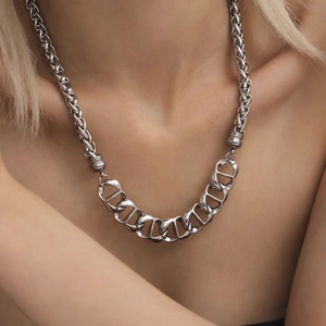Silver stainless steel pig nose chain necklace with twisted rope links on a model