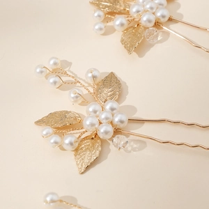 U-shaped gold hair pin with intricate pearls and leaf cluster for bridal wedding hair