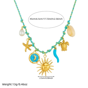 Detail of woven necklace with dimensions 45+6.5cm and multi-element gold sea charms