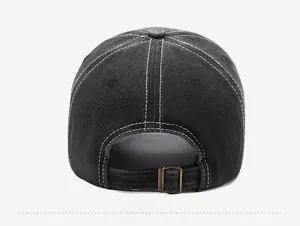 Detail view of washed dark grey cotton baseball cap with adjustable metal buckle back