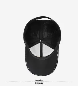 Detailed interior of black baseball cap featuring SPORT embroidered lining and clean seams