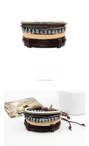 Detail view of multilayer braided leather bracelet with beads and adjustable drawstring