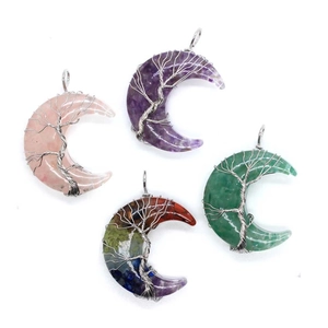 Handmade tree of life crystal crescent moon pendants in quartz and amethyst