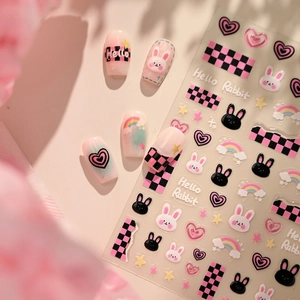 Checkerboard heart and rabbit nail art stickers with Y2K millennium style aesthetic