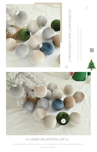Detailed texture of velvet Christmas balls in various elegant Morandi color tones