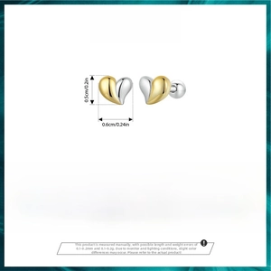 Macro detail of S925 silver heart studs with dimensions 0.5cm by 0.6cm and two-tone finish