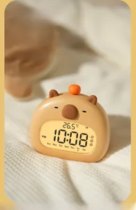 Detail of Capybara smart clock screen showing time, temperature, and battery life