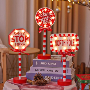 LED Christmas Santa Stop Here sign decorations with warm white lights and festive red frame
