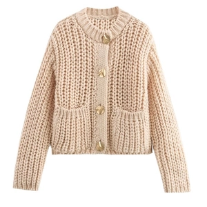 Beige chunky knit cardigan for women with gold textured buttons on white background
