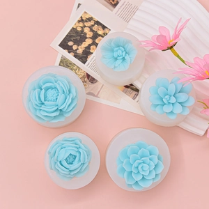 Detailed macro view of finished blue flower candles made from DIY silicone molds