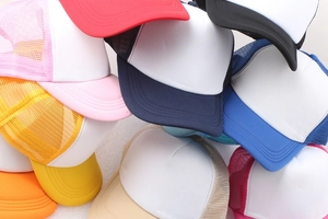Wholesale adjustable mesh trucker hats in multiple colors with white front for custom logos