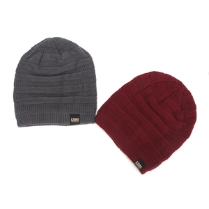 Winter knitted beanie hats in dark grey and wine red with warm striped texture