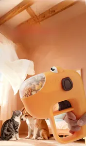 Interactive pet toy gun for dispensing treats with transparent window and orange body