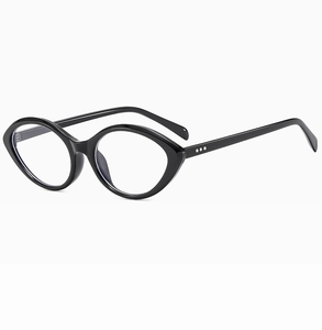 Detail view of black cat-eye sunglasses featuring vintage rivets and chunky frames