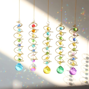 Five golden spiral tail wind spinners with multicolor crystals and rainbow prism pendants