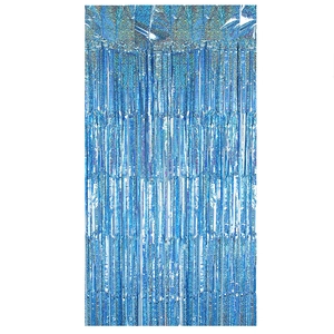 Close-up of blue metallic fringe curtain with wave texture for mermaid party decor