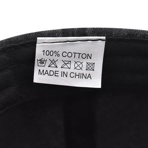 Detail of internal care label on 100% cotton America baseball cap with clean stitching
