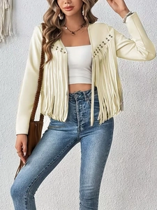 Detail of cream tassel jacket with metal rivets and fringe trim on the sleeves