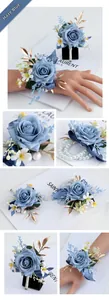 Detailed close-up of haze blue silk rose wedding boutonniere and wrist corsage set